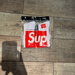 Hanes White Crew Socks with Red Logo Panel